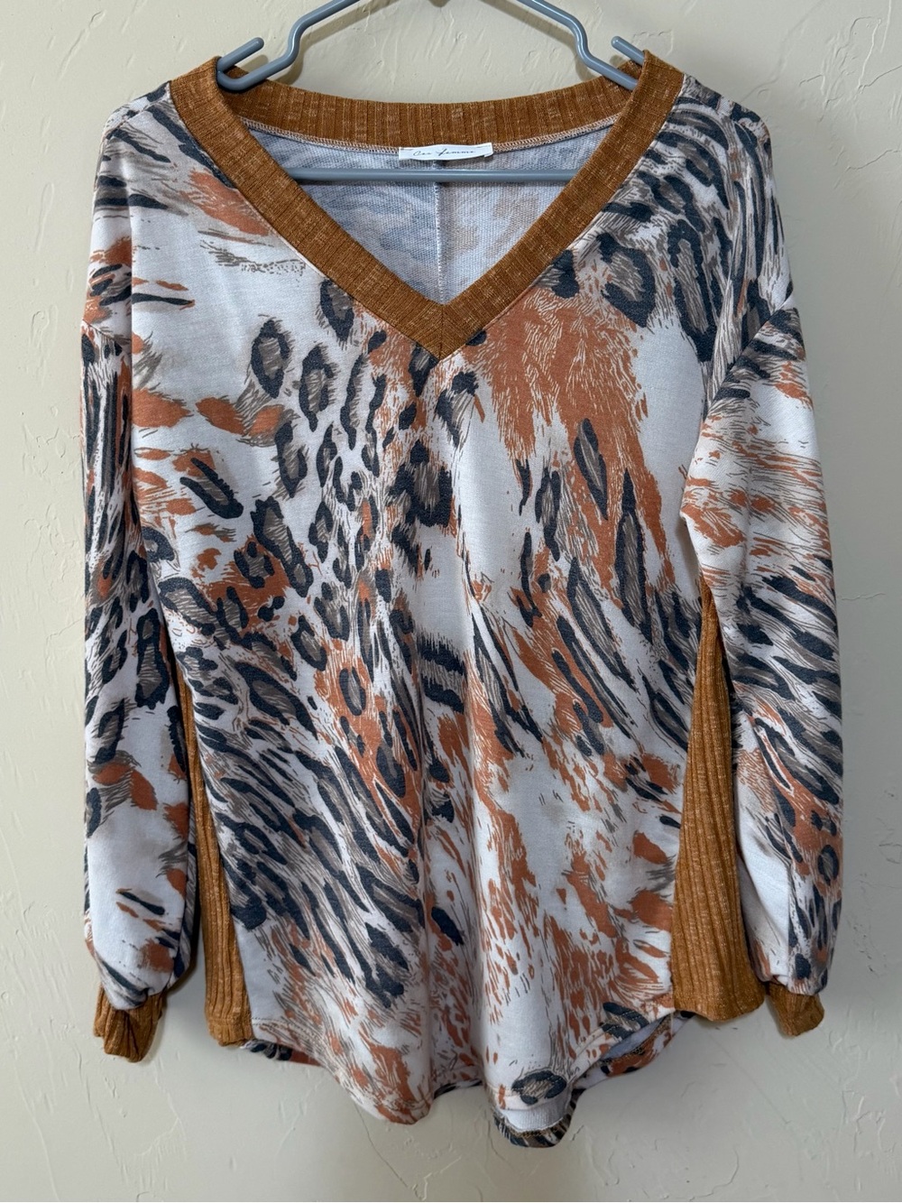 Ces Femme V-Neck Animal Print Sweater in Gold, Black and Cream